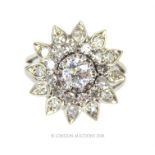 A stunning, French, platinum and diamond, star-shaped, cocktail ring