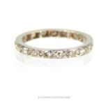 A vintage, platinum and diamond set eternity band