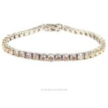 A stunning, 18 ct white gold and diamond tennis bracelet