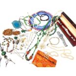 An assortment of vintage, costume jewellery