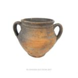 A Roman, earthenware, twin-handled vessel
