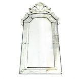 A large, fine, Venetian style mirror with engraved and moulded glass details