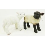 Two large, decorative, painted, resin lambs