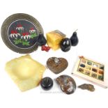 A collection of stone fruit sculptures, together with other items