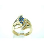 A 9 ct yellow gold, sapphire and diamond ring