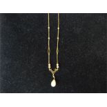 A vintage 9 ct yellow gold and faux pearl drop necklace