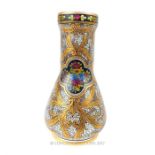 A hand painted and gilded glass vase