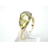 A striking, vintage, 9 ct yellow gold and citrine and diamond ring