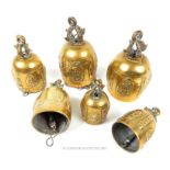 A graduated set of six, antique, Indian, brass temple bells