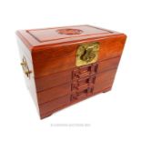A large, Chinese hard wood and brass jewellery box