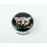 A sterling silver circular pill box, the led decorated with a fox's head
