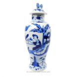 A 19th century, hand painted, Chinese, blue and wide vase and cover