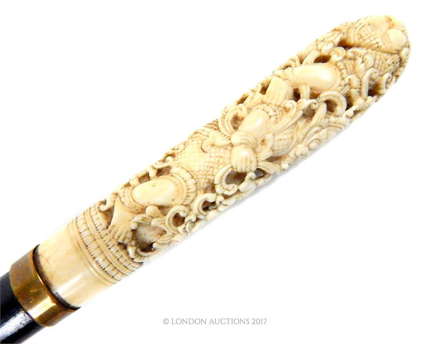 An early 20th century, black silk-satin Edwardian umbrella with fine Burmese Carved Ivory Handle, - Image 2 of 3