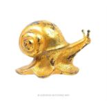 A Chinese gilt bronze figure of a snail