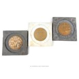 Three, vintage zodiac tiles each set with circular, bronzed metal plaques