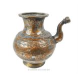 A 19th century Islamic copper teapot