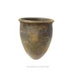 A Roman, dark-coloured, earthenware beaker