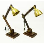 A pair of adjustable desk lamps