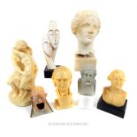 A collection of figures including a bust of George Washington