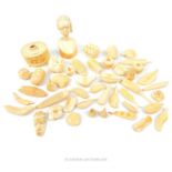 A collection of 1920's, carved bone, decorative items
