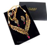 A stunning, boxed, gold plated necklace and earring set