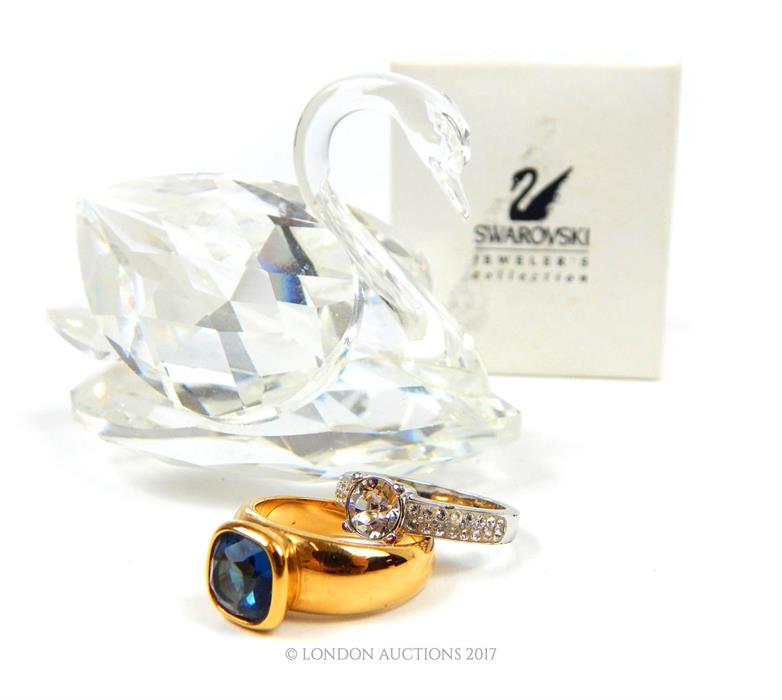 Two Swarovski rings together with a Swarovski crystal swan