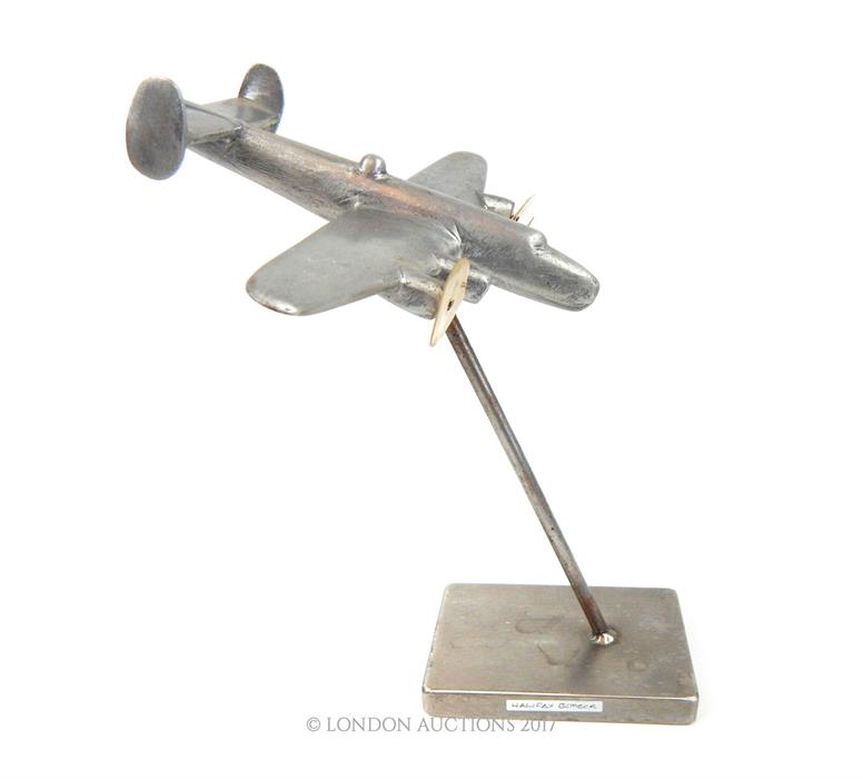 A white metal model of a WW2 Halifax bomber, on stand. - Image 2 of 3