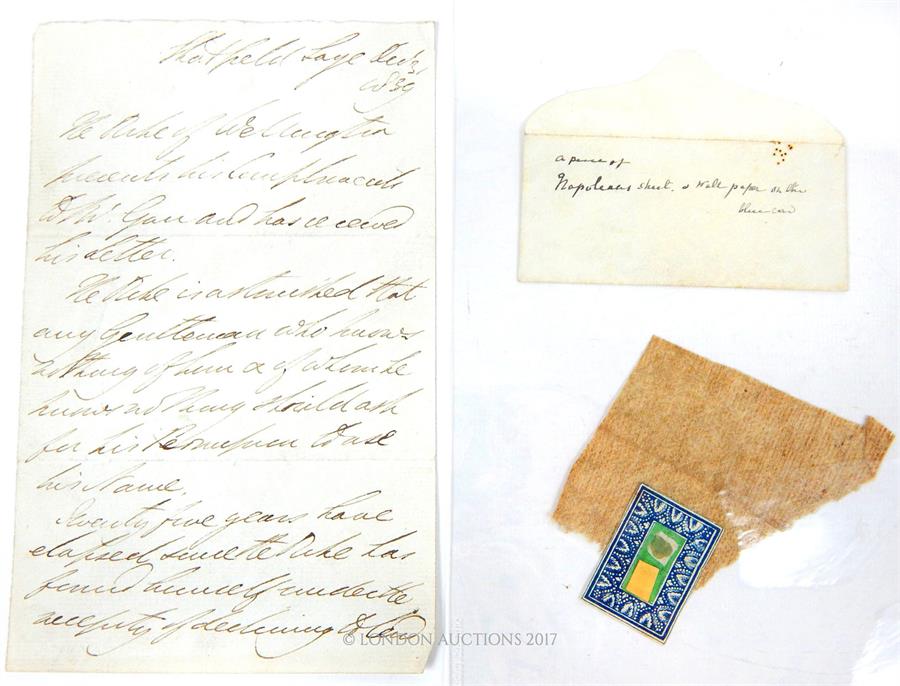 An 1839 Duke of Wellington letter written in the third person, together with a small piece of fabric