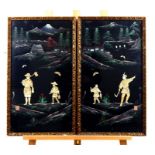 A pair of early 20th century oriental lacquer panels inlaid with bone figures set against a hand