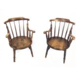 A pair of fruitwood open armchairs