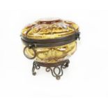An early 20th century, hand-blown, amber-coloured glass, jewellery casket