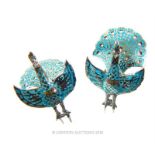 A pair of silver and enamel earrings.