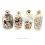 Four Chinese reverse painted glass snuff bottles