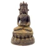 A 20th century Tibetan bronze seated Buddha figure