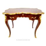 A late 20th century reproduction Louis XIV writing desk; a/f.