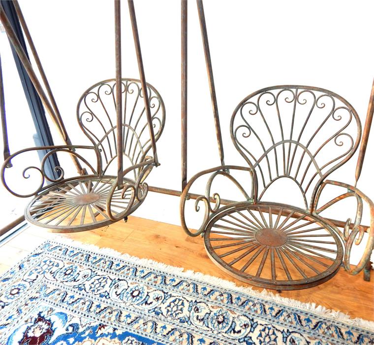 A distressed metal framed double seated, swinging garden chair. - Image 2 of 3