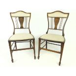 A pair of Edwardian side chairs.