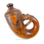 A Mughal period Indian carved wood powder flask