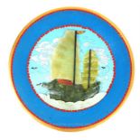 A cloisonne plate inlaid with a relief carved jade Chinese junk boat; 31cm diameter.