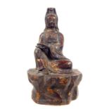 A bronzed buddha; 22cm high; with a four character mark.