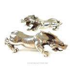 A pair of decorative, Chinese, silvered, dragons