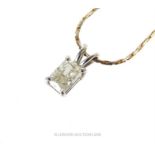 A 14 ct white gold and diamond solitaire pendant and chain (0.75 carats)