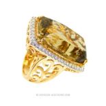 A substantial, 18 ct yellow gold, lemon citrine and diamond dress ring