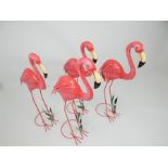 Four metal ware flamingos; each 78cm high.