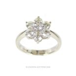 An 18 ct white gold, diamond cluster ring (1.25 carats)