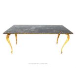 An elegant, gilt metal and black-veined marble coffee table