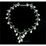 An impressive, sterling silver, peridot, marcasite and cultured pearl drop necklace