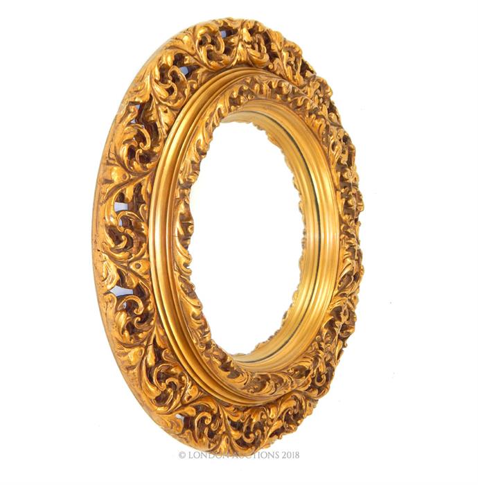 A vintage, carved, gilt-wood, circular wall mirror with convex glass panel - Image 2 of 2