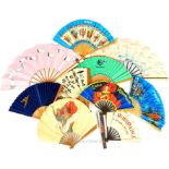 11 retro fans, featuring designs for an Eiffel Tower tour, Japan Airlines, BOAC, Cognac