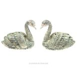 A pair of unusual 800 silver, swan condiments with ruby-set eyes